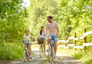 Happy family cycling