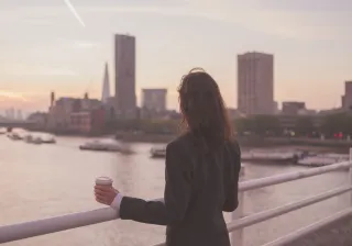 Woman looking over city