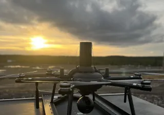 a drone in a sunset