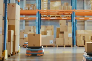 warehouse logistics robotics transferring packages