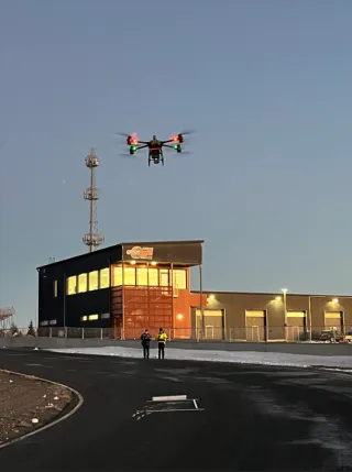 drone flying over a building